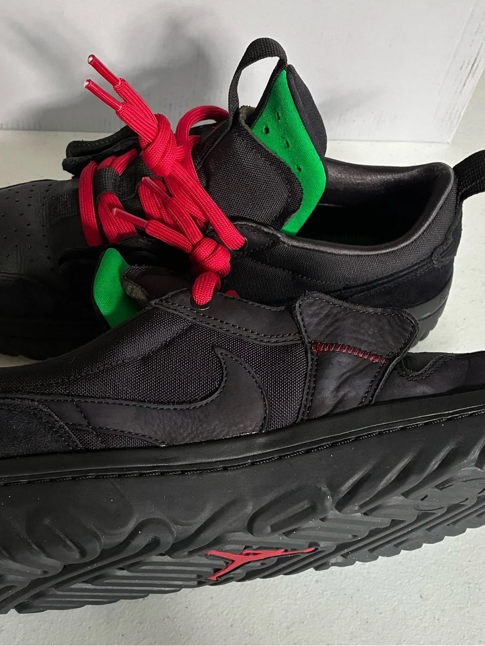 Nike Men’s Black Sneakers with Red Swoosh and Red Laces